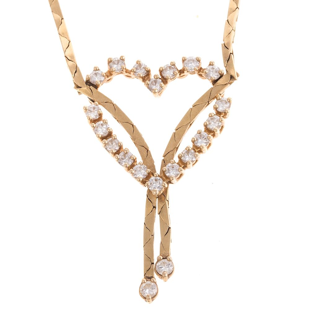 A Ladies Diamond Open Heart Necklace in 14K 14K yellow