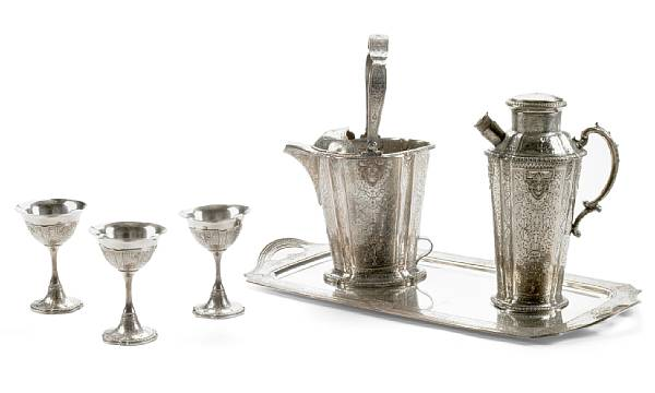 An American plated cocktail set comprising shaker ice bucket rectangular