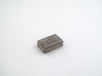 A Victorian castletop vinaigrette decorated in high relief on the
