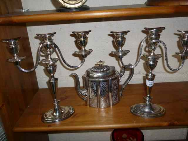 A PAIR OF THREE BRANCH SILVER PLATED CANDELABRA 11 1