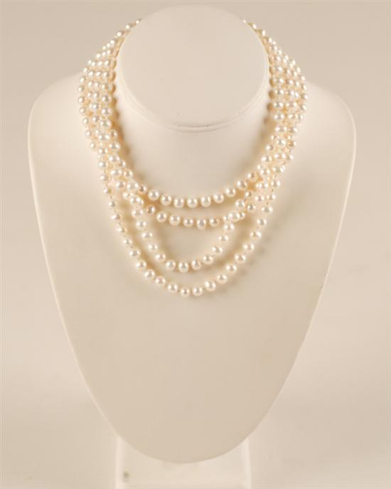 A Quadruple Strand Cultured Pearl Necklace with a 14K marked