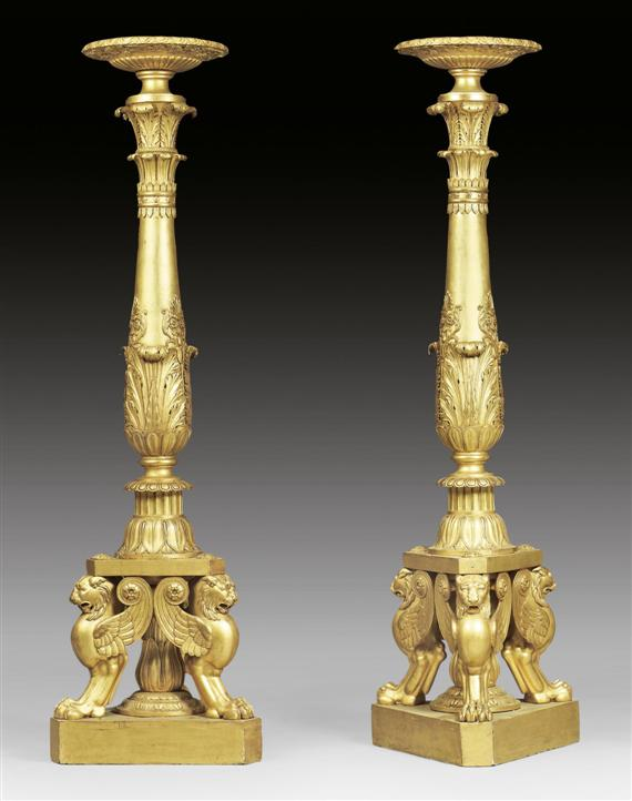 PAIR OF IMPORTANT TALL TORCHERES AUX LIONS AILES late Empire
