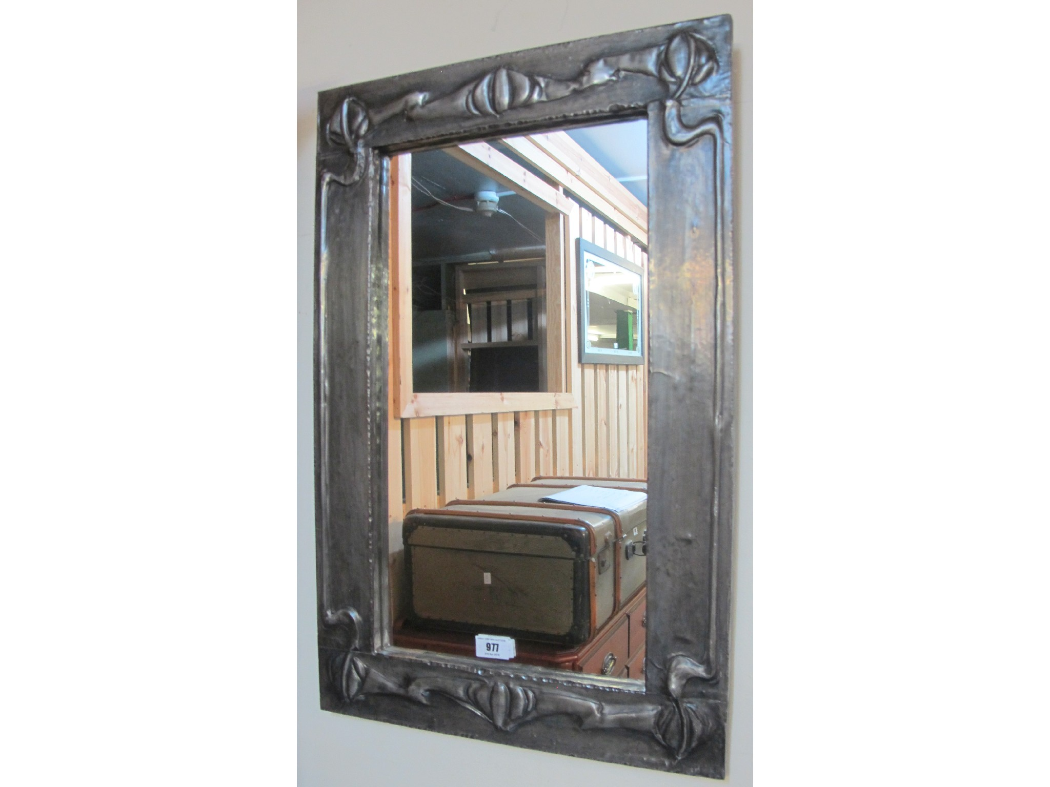 An Art Nouveau style lead wall mirror