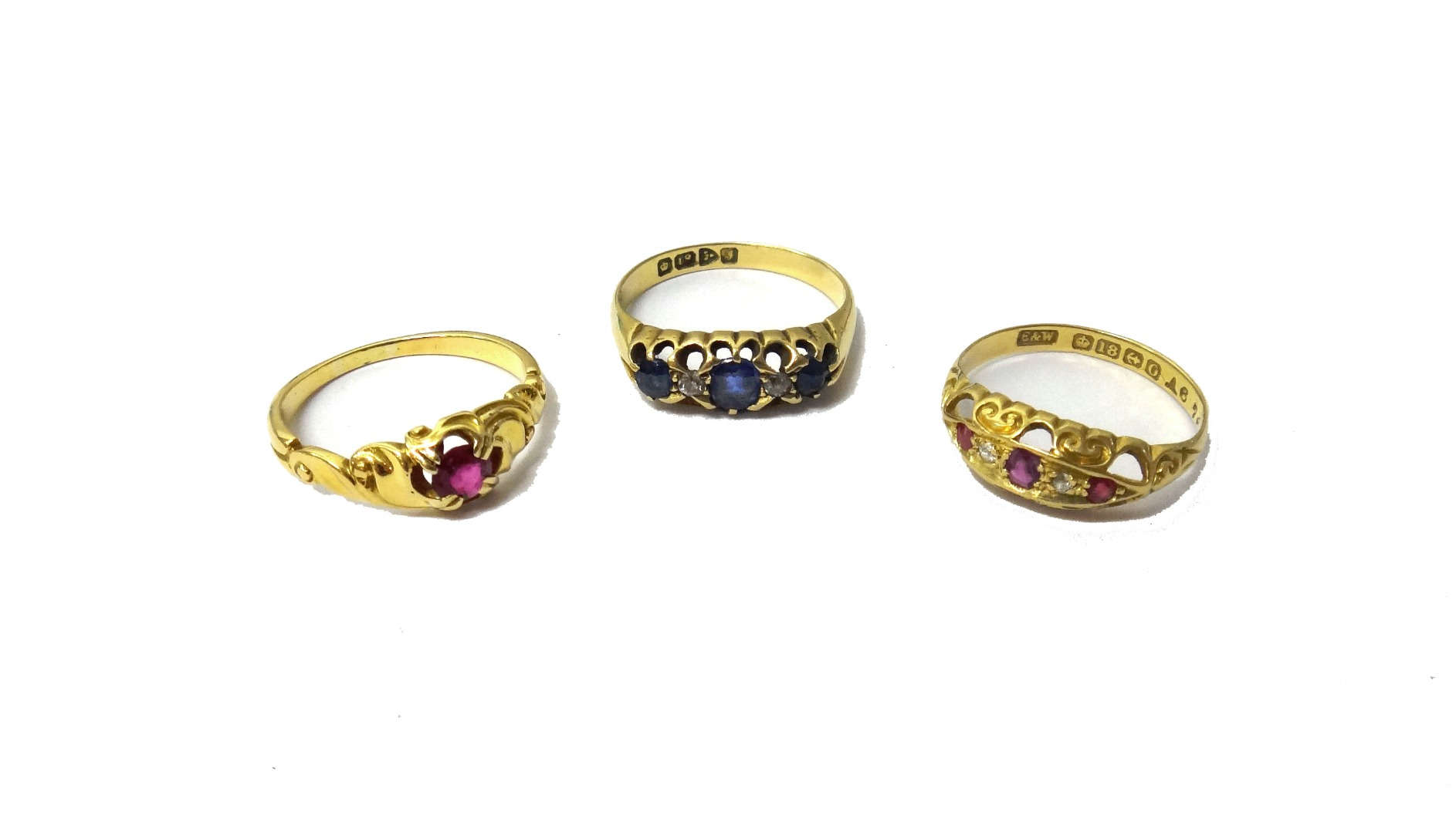 An 18ct gold sapphire and diamond set five stone ring