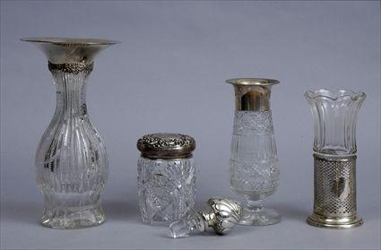 THREE SILVER MOUNTED CUT GLASS VASES AND A TOBACCO JAR