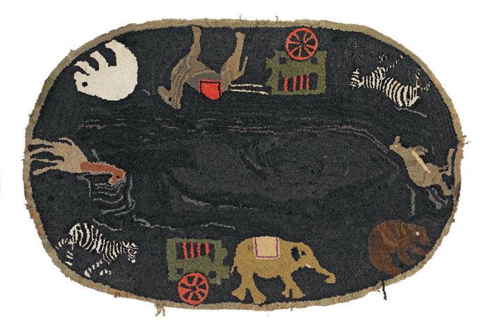 AMERICAN CIRCUS PARADE OVAL HOOKED RUG ON BLACK VARIEGATED GROUND