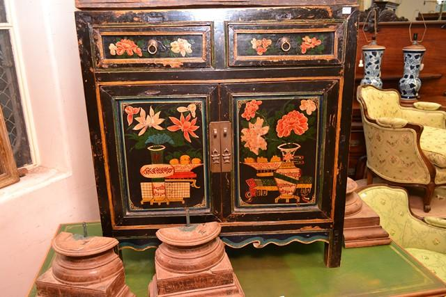 A MONGOLIAN LACQUERED CHEST WITH FLORAL DECORATION