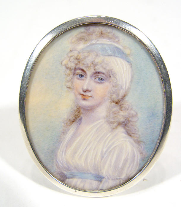 Oval 19th Century portrait miniature onto ivory of a young