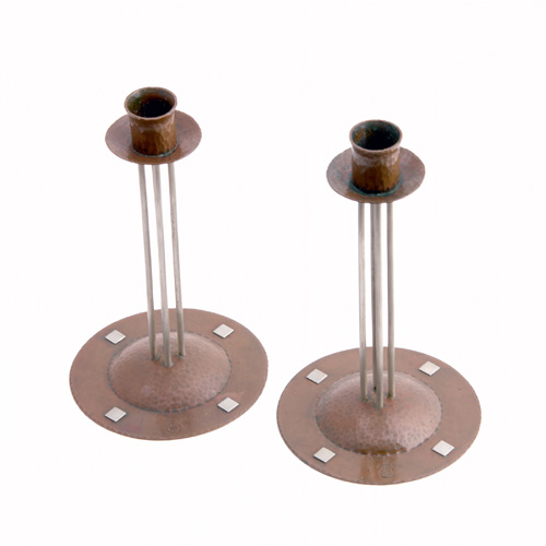 ROYCROFT Pair of Secessionist copper and silver candlesticks designed by