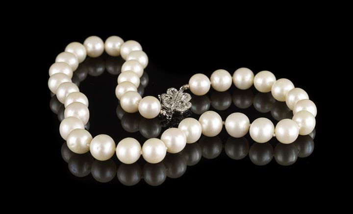Lovely Strand of Slightly Graduated South Seas Pearls of near