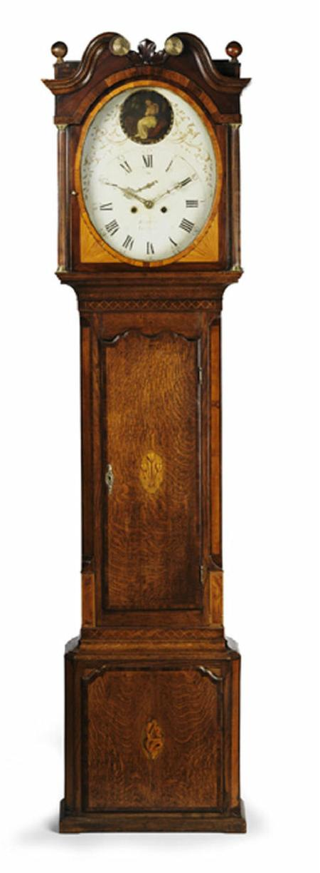 An unusual George III oak mahogany banded longcase clock the
