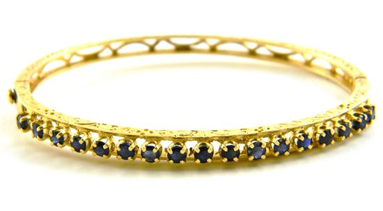 Hinged diamond bangle bracelet stamped and tested 14K yellow gold