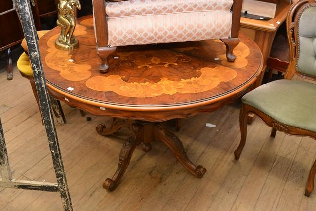 A VICTORIAN BURR WALNUT AND INLAID CENTER TABLE A VICTORIAN
