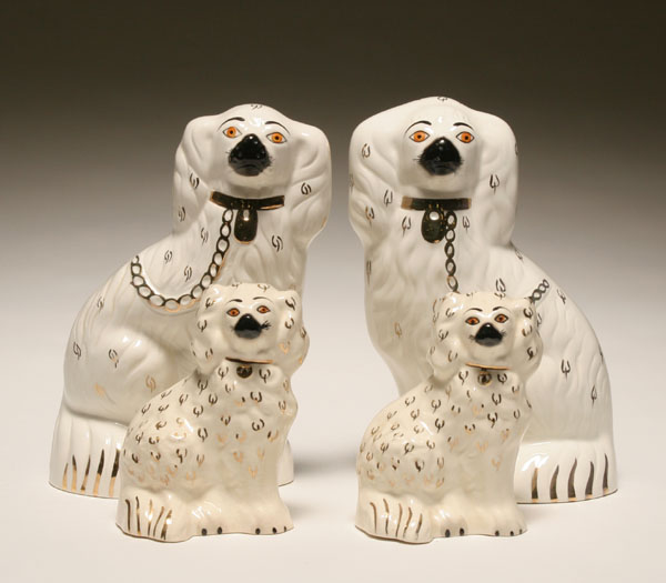 Two pairs Beswick Staffordshire type spaniels painted gilt accents and