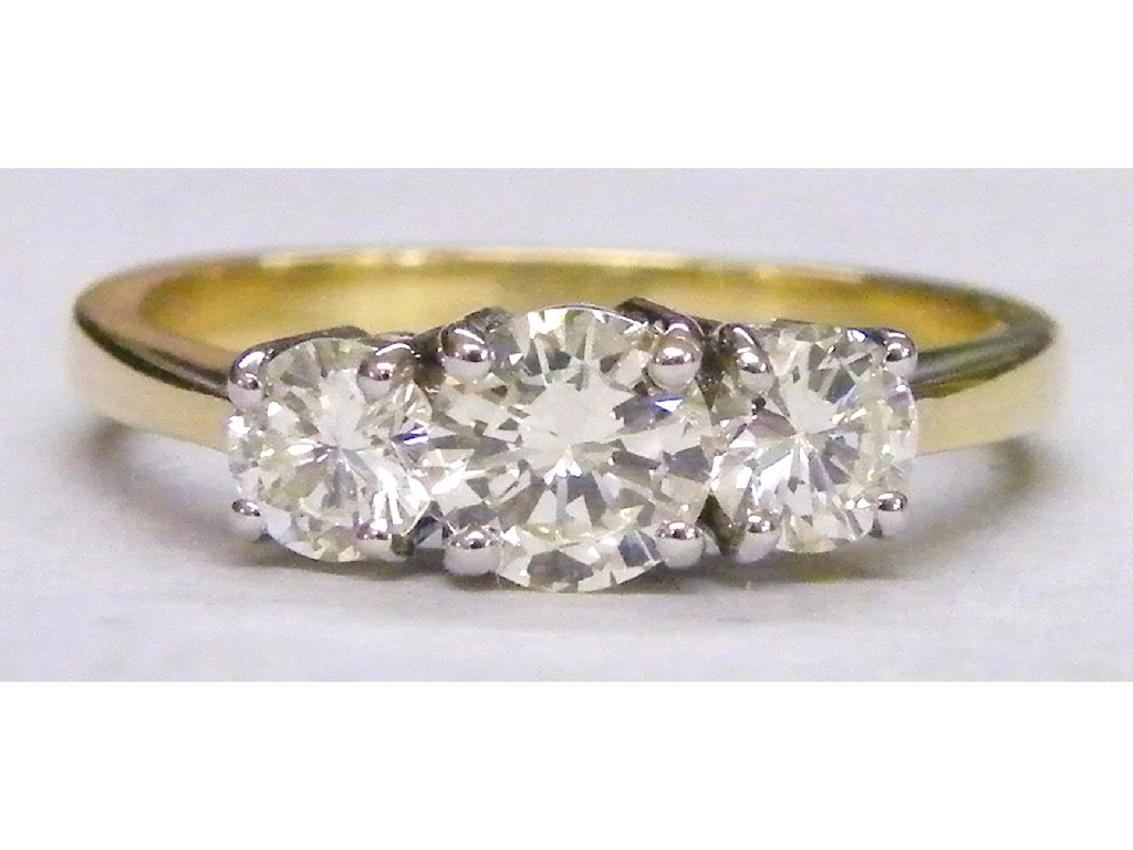 18ct three stone brilliant cut diamond ring in a white