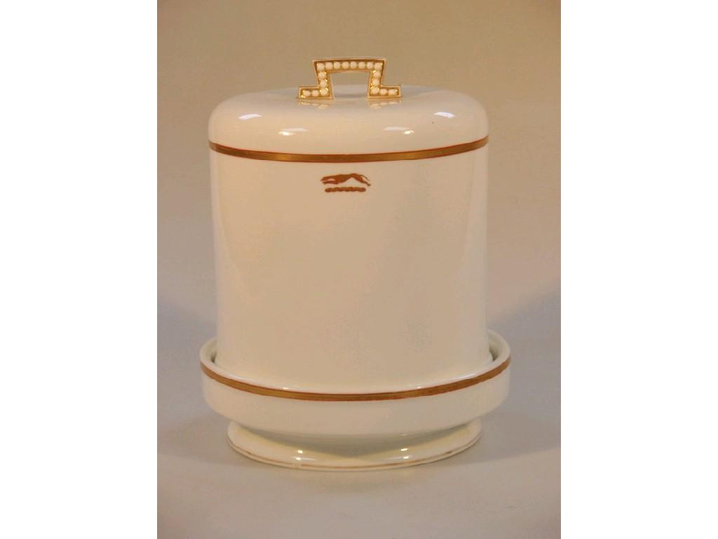 A Victorian ironstone china crested circular cheese dish and cover