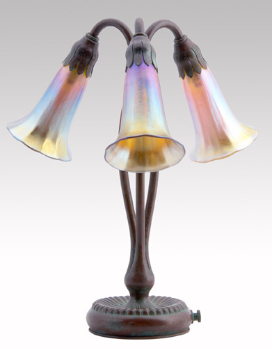 TIFFANY STUDIOS Three light Lily lamp its bronze base fitted