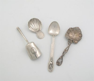 Four various small spoons a George III caddy spoon with