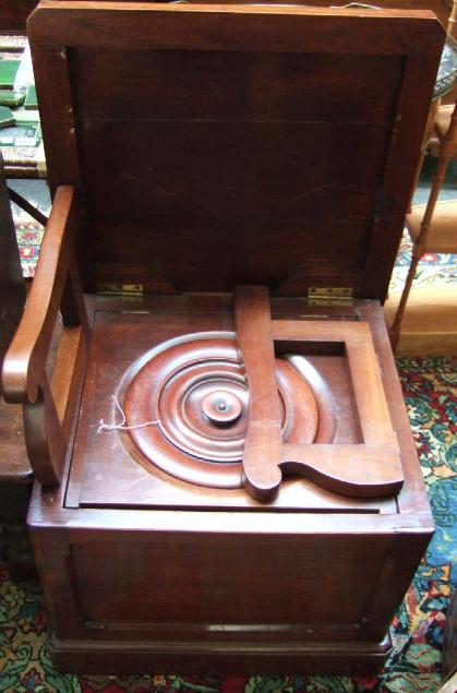 A 19th century mahogany box commode of canted square form