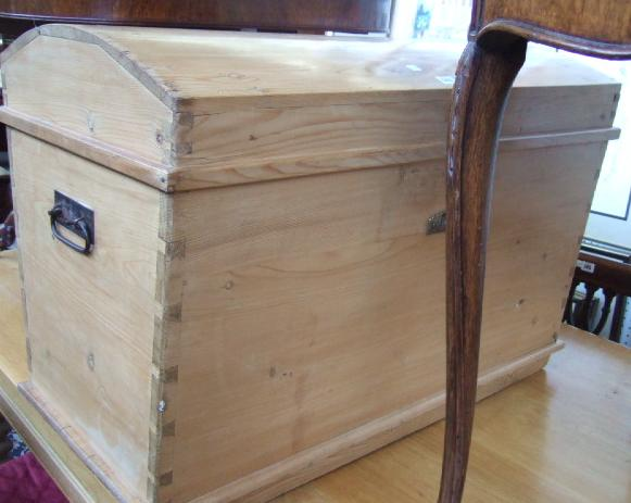 A Victorian pine domed top trunk of tapering form with