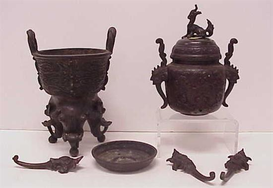 Two Japanese bronze censers the first with twisted loop handles