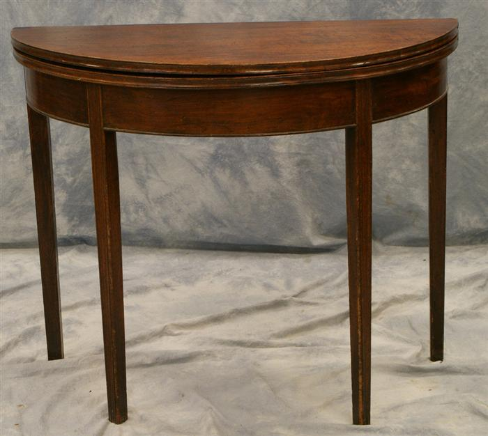 Walnut demilune Hepplewhite card table molded top and legs swing