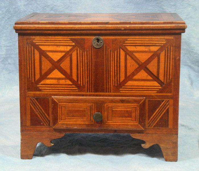 Inlaid tramp art miniature lift lid chest with drawer geometric