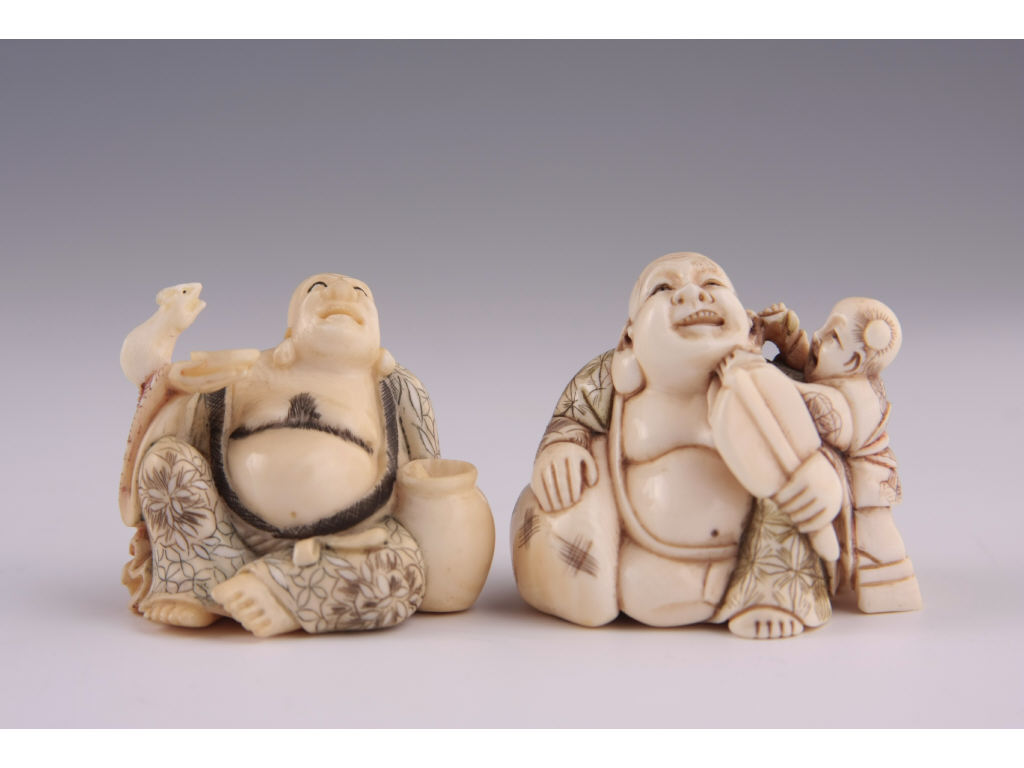 Two Netsukes Hotei Carved Ivory late period the first carving