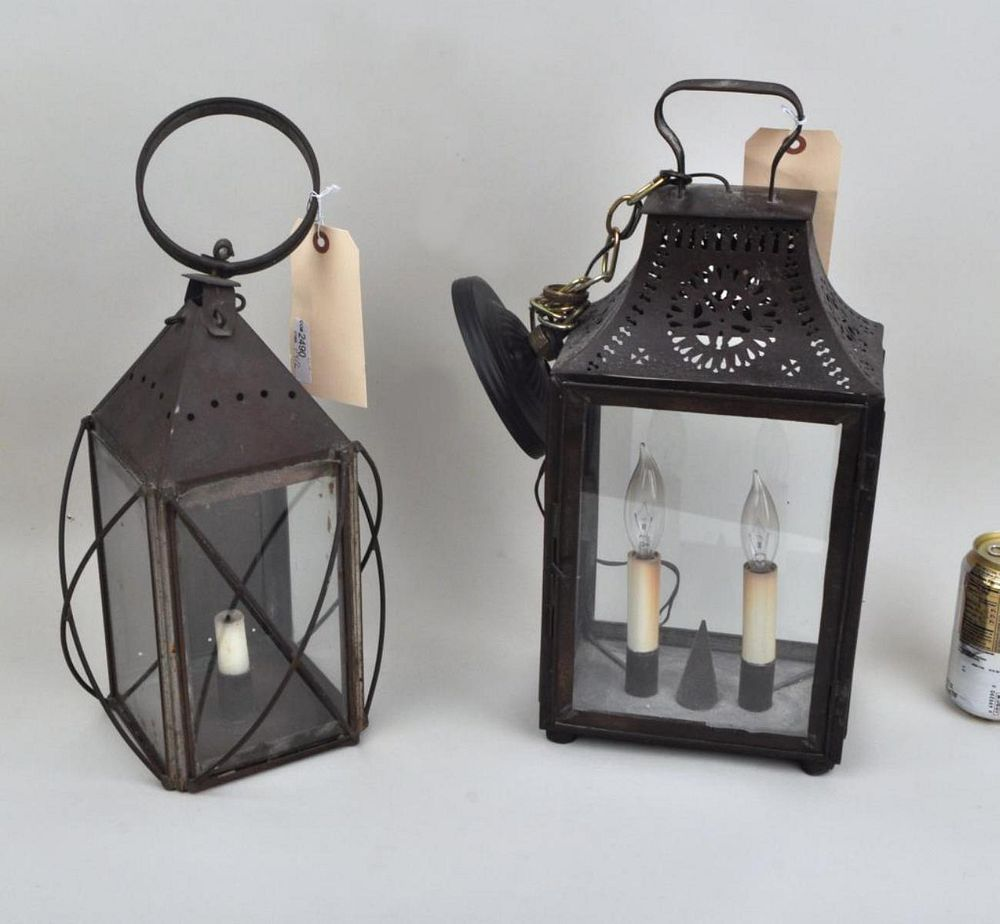Two Early Tole Punchwork Lanterns comprising a square hanging lantern