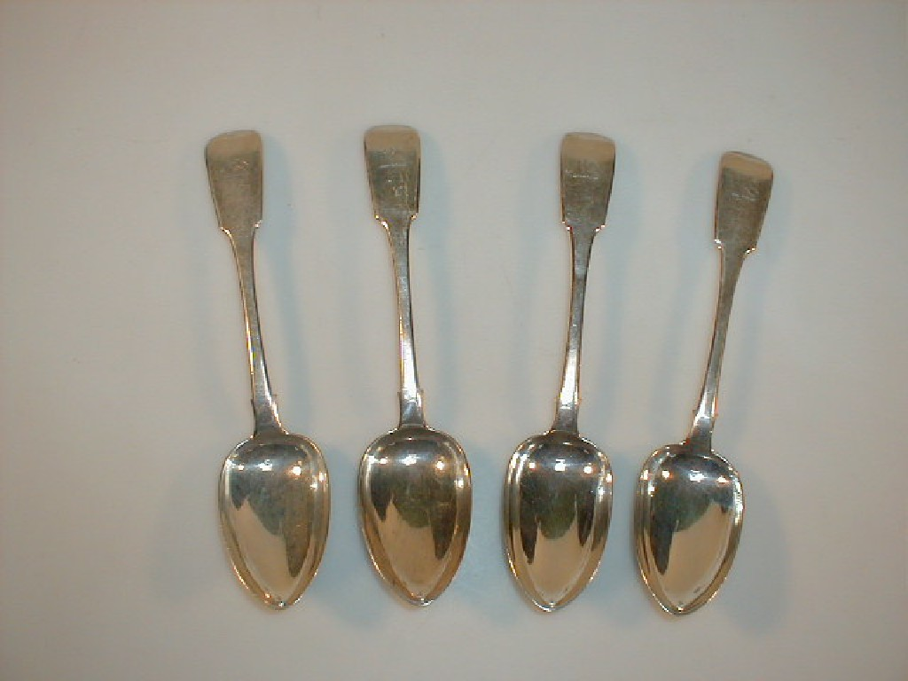 A set of four William IV silver tablespoons fiddle pattern