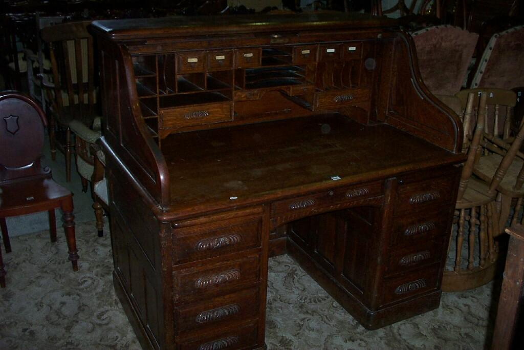A good Edwardian oak roll top desk the S shaped
