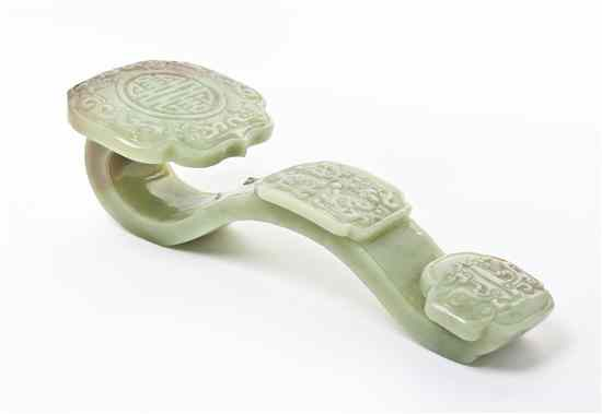 A Carved Hardstone Ruyi Scepter of celadon stone with a