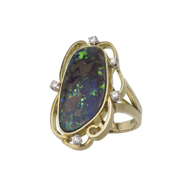 14K DIAMOND BOULDER OPAL RING 14K yellow gold ring contains
