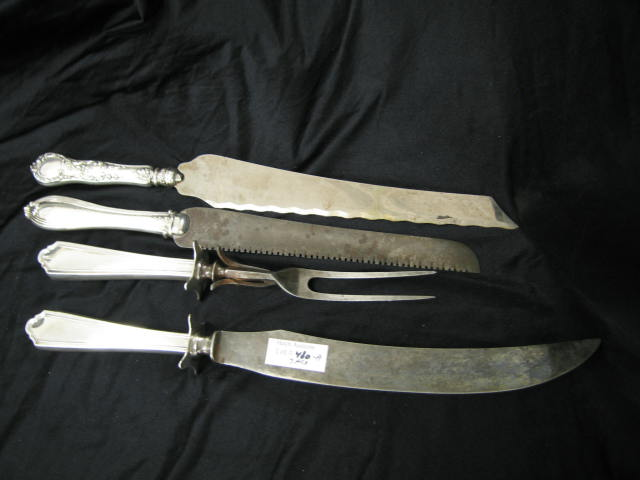 4 Sterling Handled Items 2 cake knives and a roast