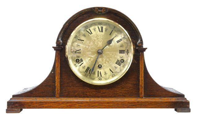 English mantel clock Clarion Clock Company 20th c having shaped