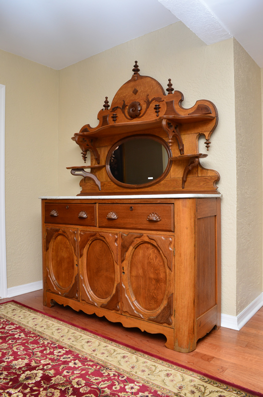 VICTORIAN MARBLE TOP SIDEBOARD Shaped crest with applied decoration open