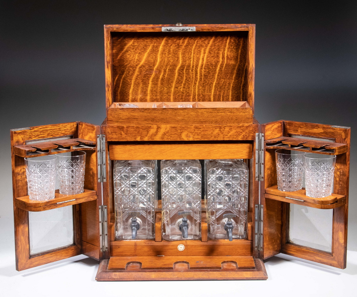 ENGLISH PORTABLE LIQUOR CHEST Early 20th c Oak Cased Campaign
