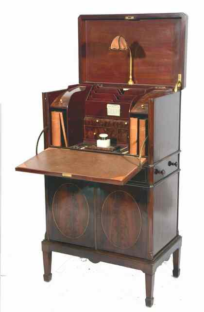 A MAHOGANY WRITING CABINET the interior fitted pigeon holes compartments