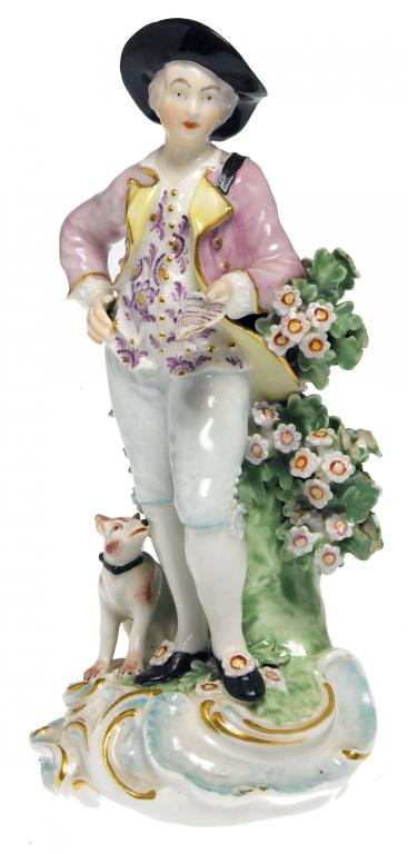 A DERBY FIGURE OF A GARLAND SHEPHERD with a hound
