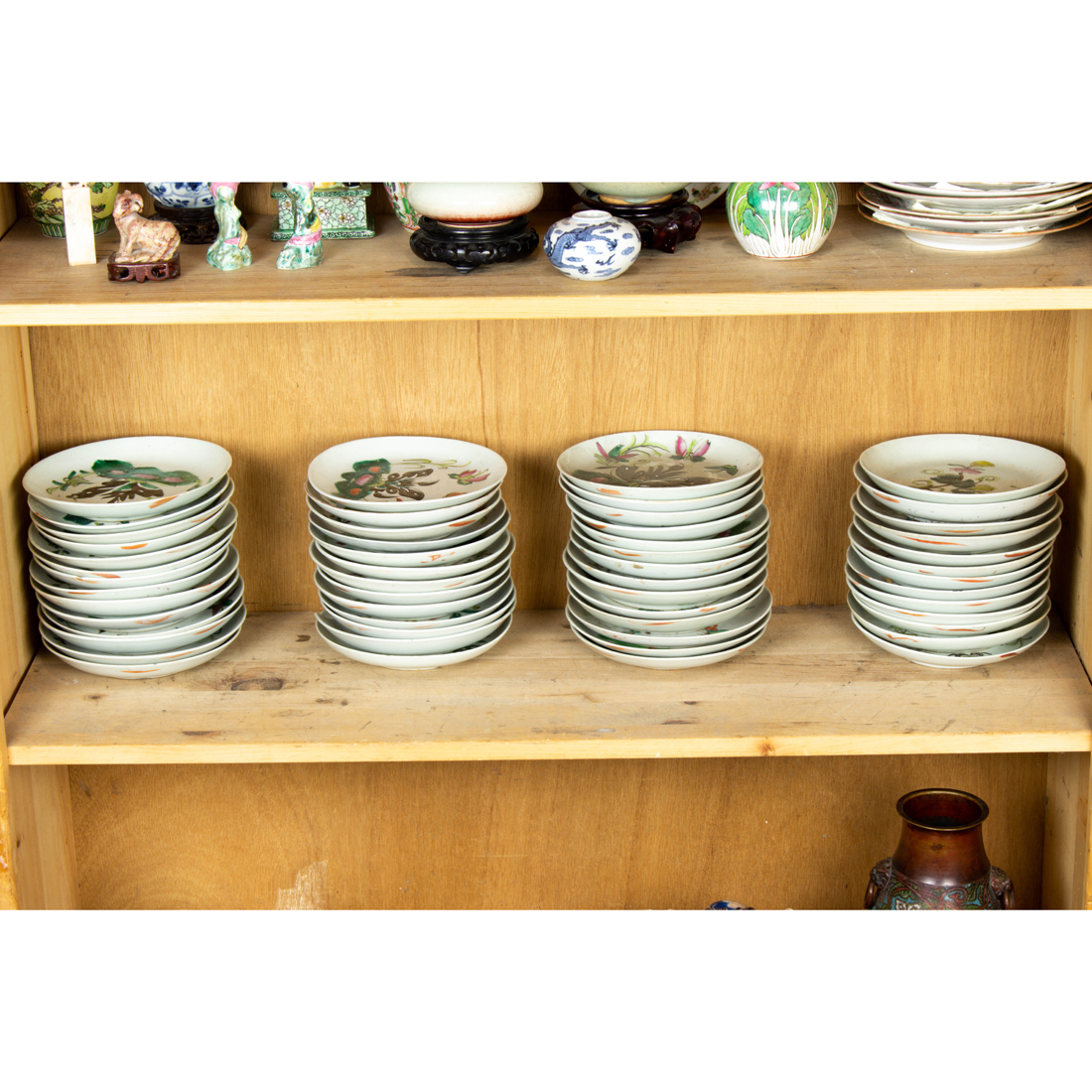 SHELF OF CHINESE FAMILLE ROSE BUTTERFLY DISHES Shelf of Chinese