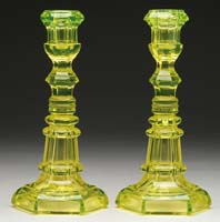 PAIR OF EARLY FLINT CANARY YELLOW CANDLE STICKS With deep