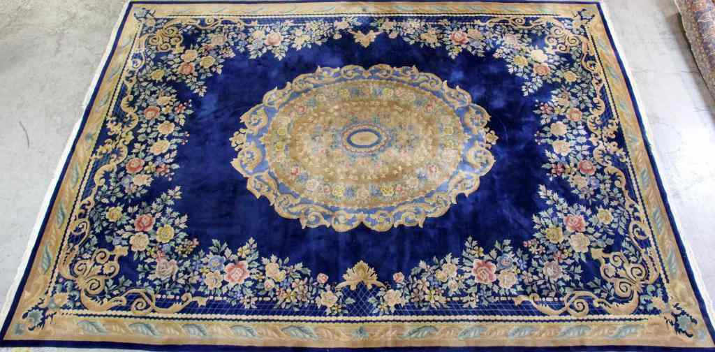 Large Wool Persian CarpetHaving royal blue ground with cream scroll