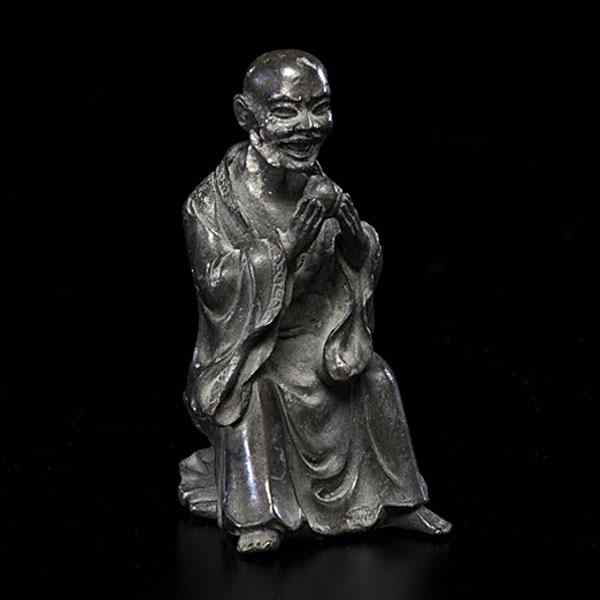 Chinese Bronze Scholar Chinese Ming Period A bronze seated Buddhist