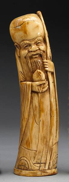A tinted ivory figure of Shoulao The god of longevity