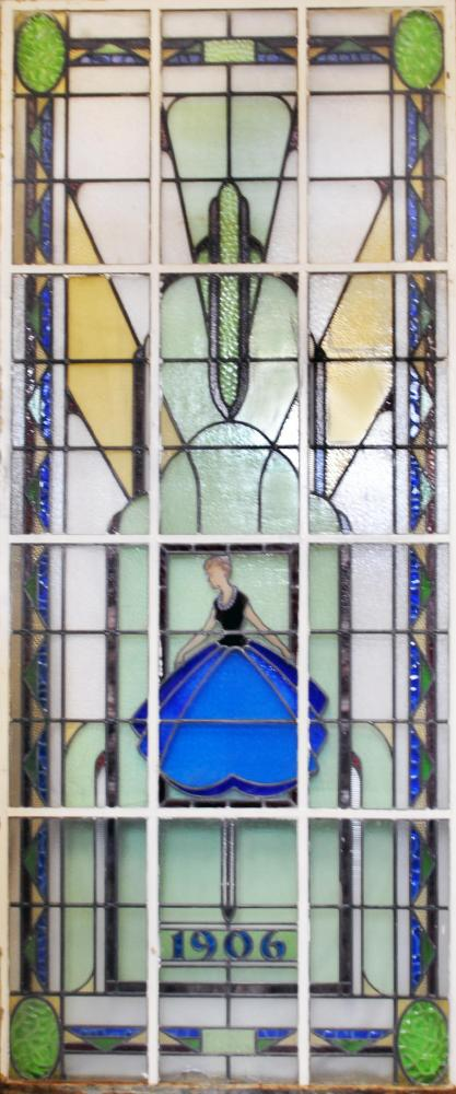 A SUITE OF STAINED AND PAINTED GLASS PANELS early 20th