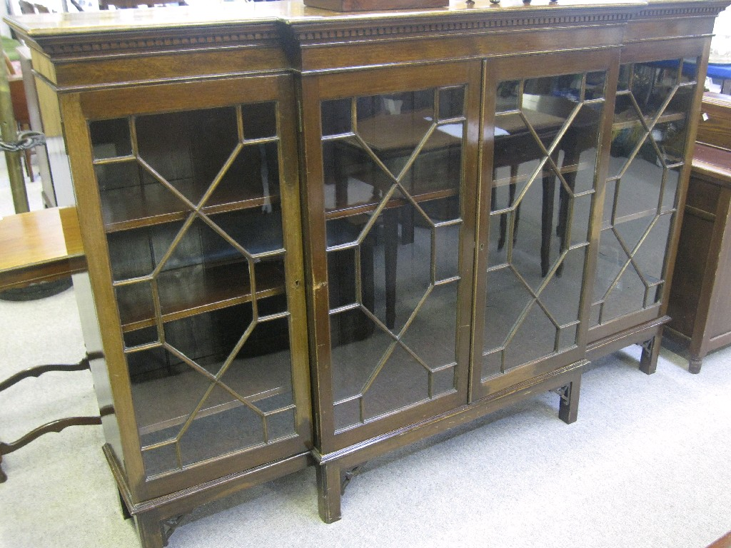 Mahogany breakfront and astragal glazed four door bookcase