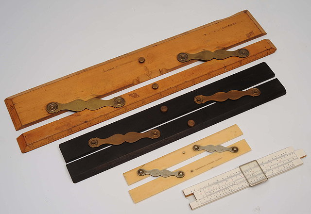 A GEORGIAN IVORY RULER with scales for 5 chains to