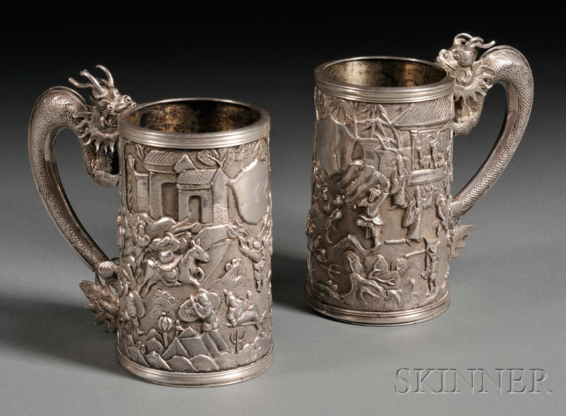 Pair of Chinese Export Dragon Figural handled Repousse Silver Mugs