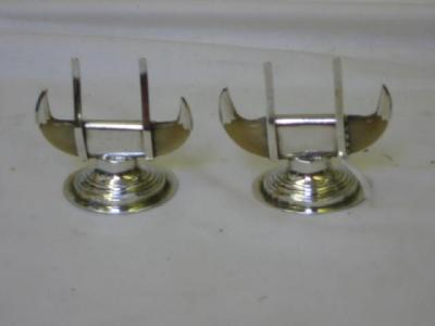 A PAIR OF EDWARDIAN MENU HOLDERS with mounted claw terminals