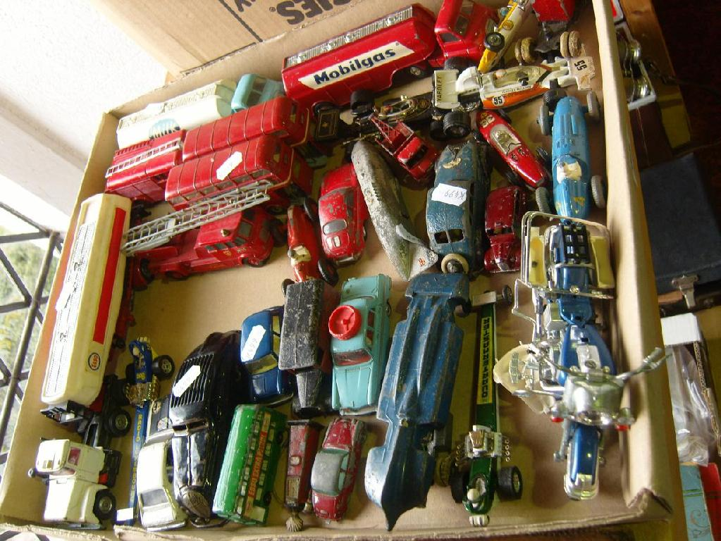 A collection of post war toy vehicles including a Schuco